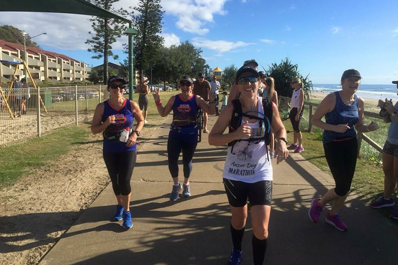 Sally Cameron with a group participating in the ANZAC Day Marathon