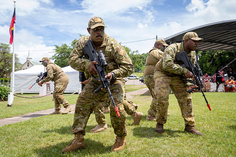 Image: Department of Defence | Members of 51 FNQR perform a traditional dance during the 90th anniversary ceremony of the Torres Strait Island Light Infantry Battalion.