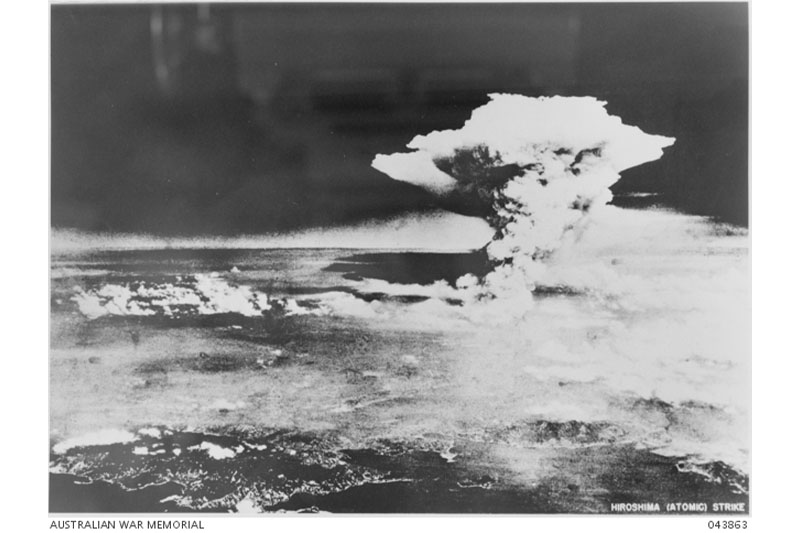 The atomic bomb explodes over Hiroshima on 6 August 1945. Photographer unknown, 1945, AWM 043863.