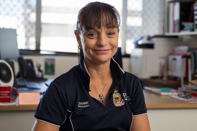 Navy veteran Dannielle Brearley wearing an RSL Queensland sub branch t-shirt.