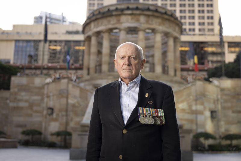 Veteran Kel Ryan standing at ANZAC Square in Brisbane